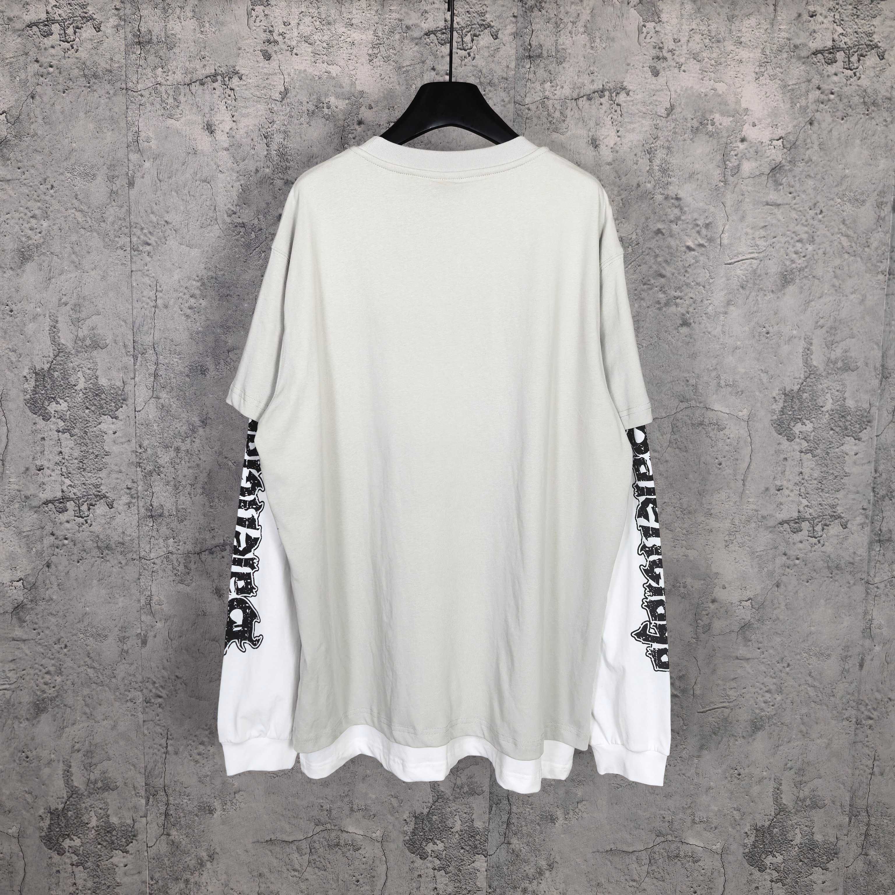 Off-white long T-shirt, crew neck, graphic text on both sleeves, plain back