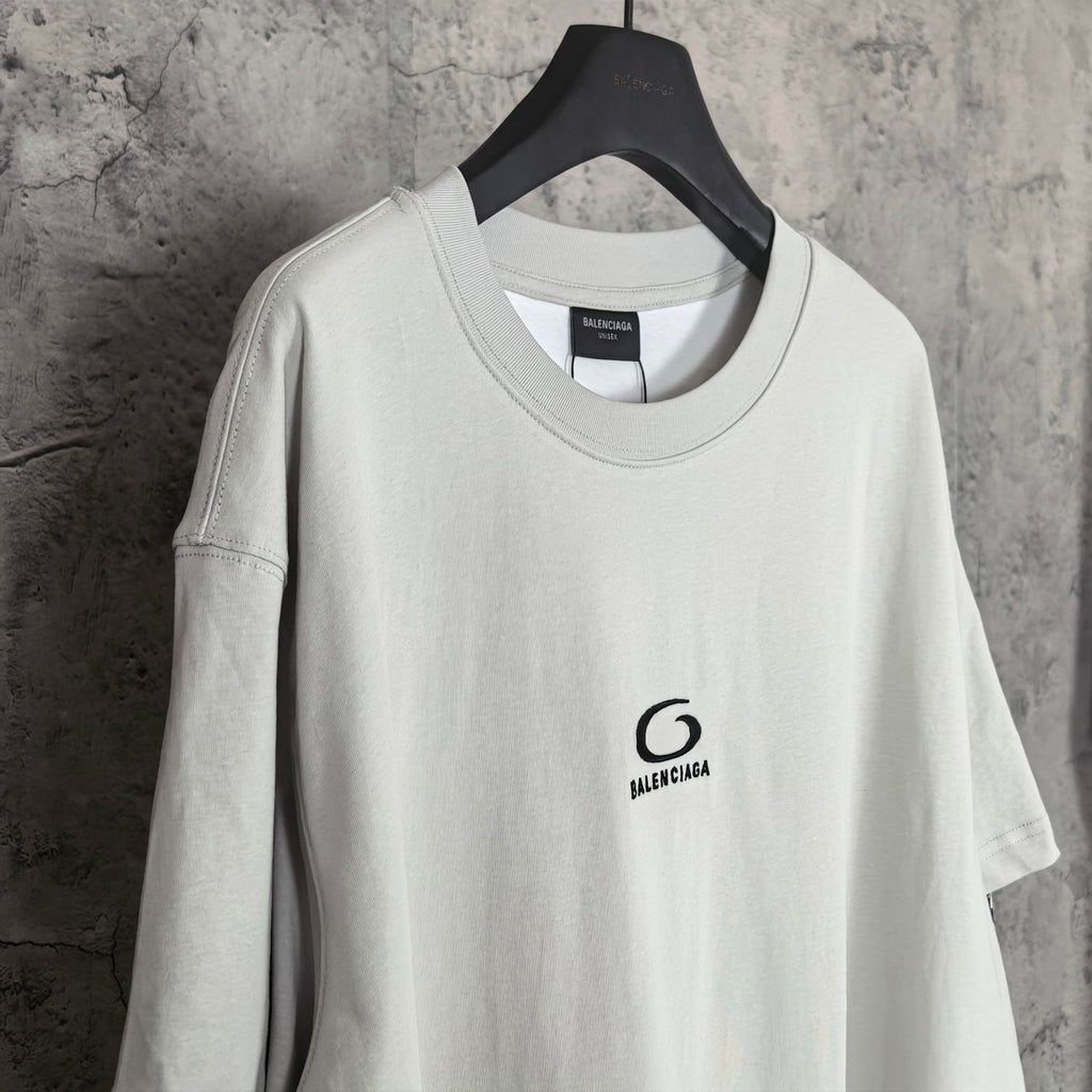 Off-white long T-shirt with crew neck and small chest Balenciaga logo