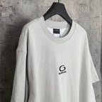Off-white long T-shirt with crew neck and small chest Balenciaga logo