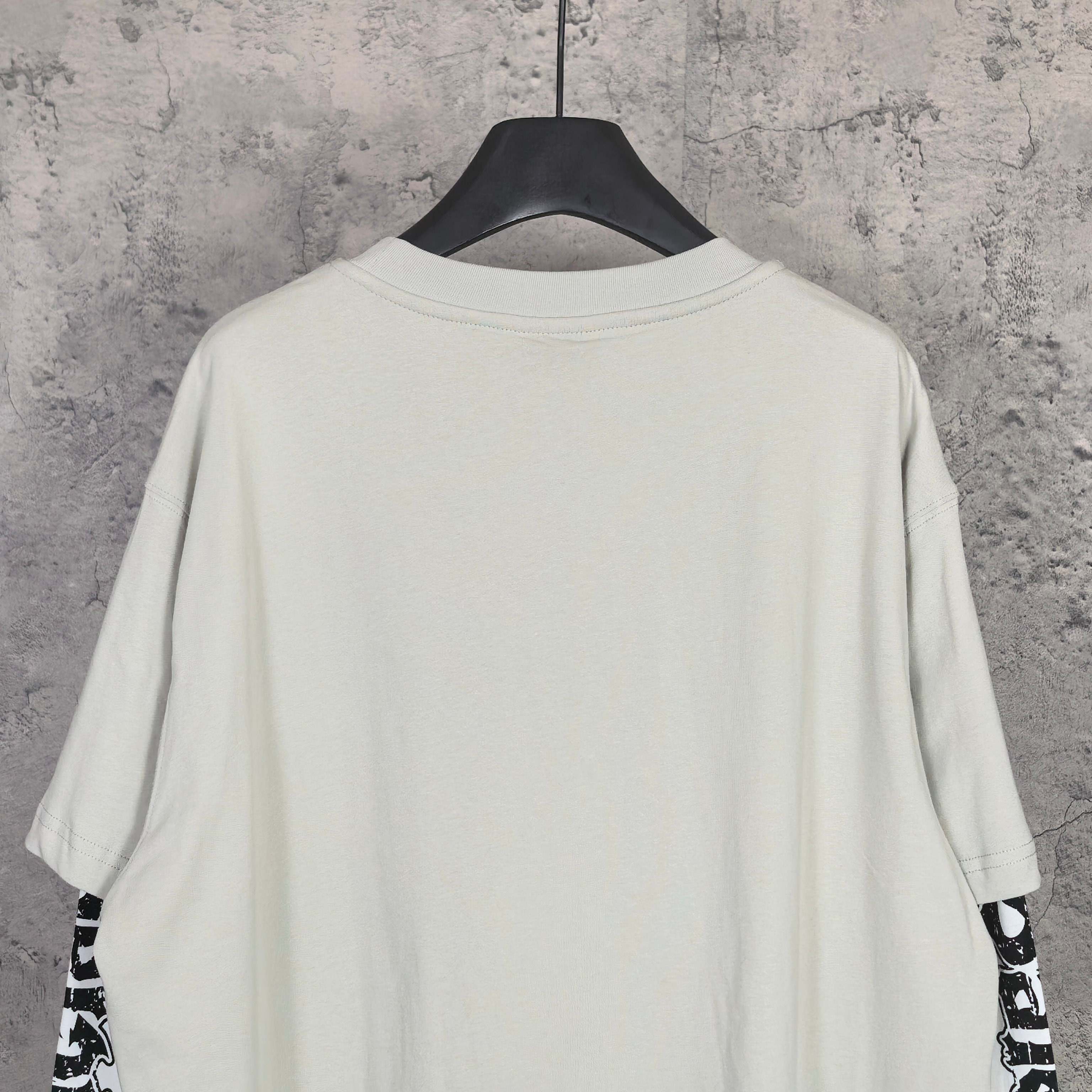 Off-white long T-shirt, crew neck, plain back with graphic sleeve text