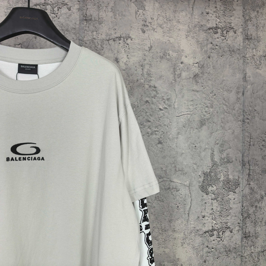 Off-white long T-shirt with chest logo and black patterned sleeve print