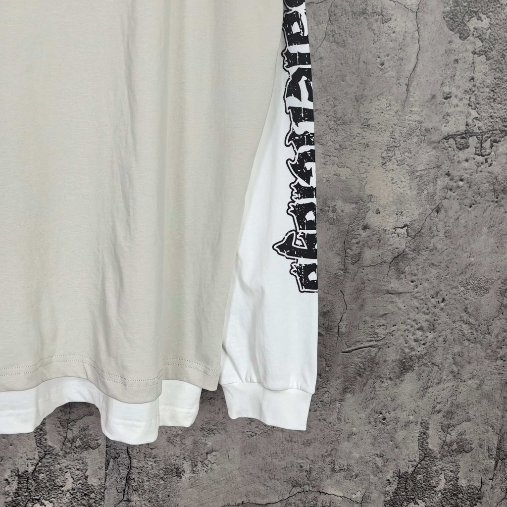 Balenciaga long-sleeve T-shirt, white torso with black vertical sleeve text