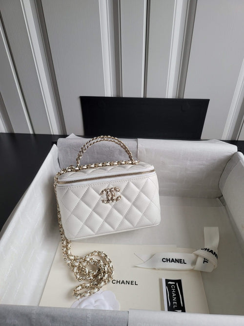 Chanel bag, white quilted leather with gold chain strap and top zip closure