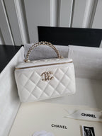 Chanel bag, white quilted leather with gold chain strap and front CC emblem