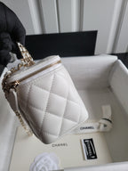 Chanel white quilted crossbody bag with chain strap and zip top, front view