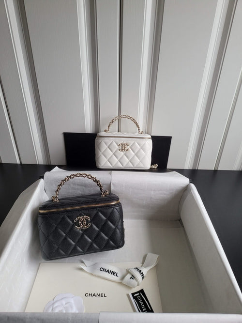 Chanel quilted handbag set: white mini bag and black mini bag with chain straps