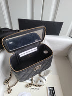 Chanel quilted crossbody bag with open top showing card slots, gold zipper trim