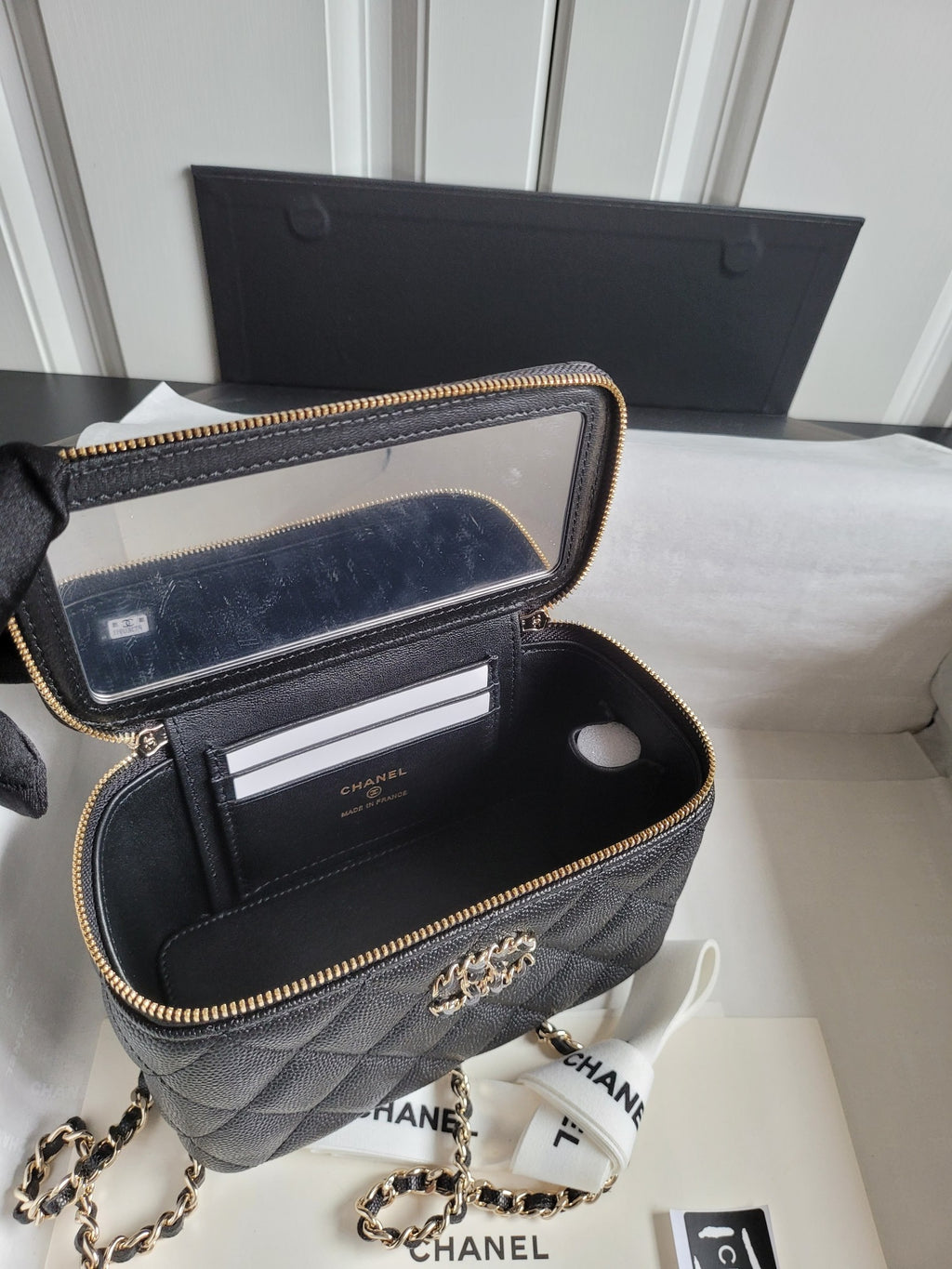 Chanel quilted crossbody bag with open top, card slot divider, gold chain strap