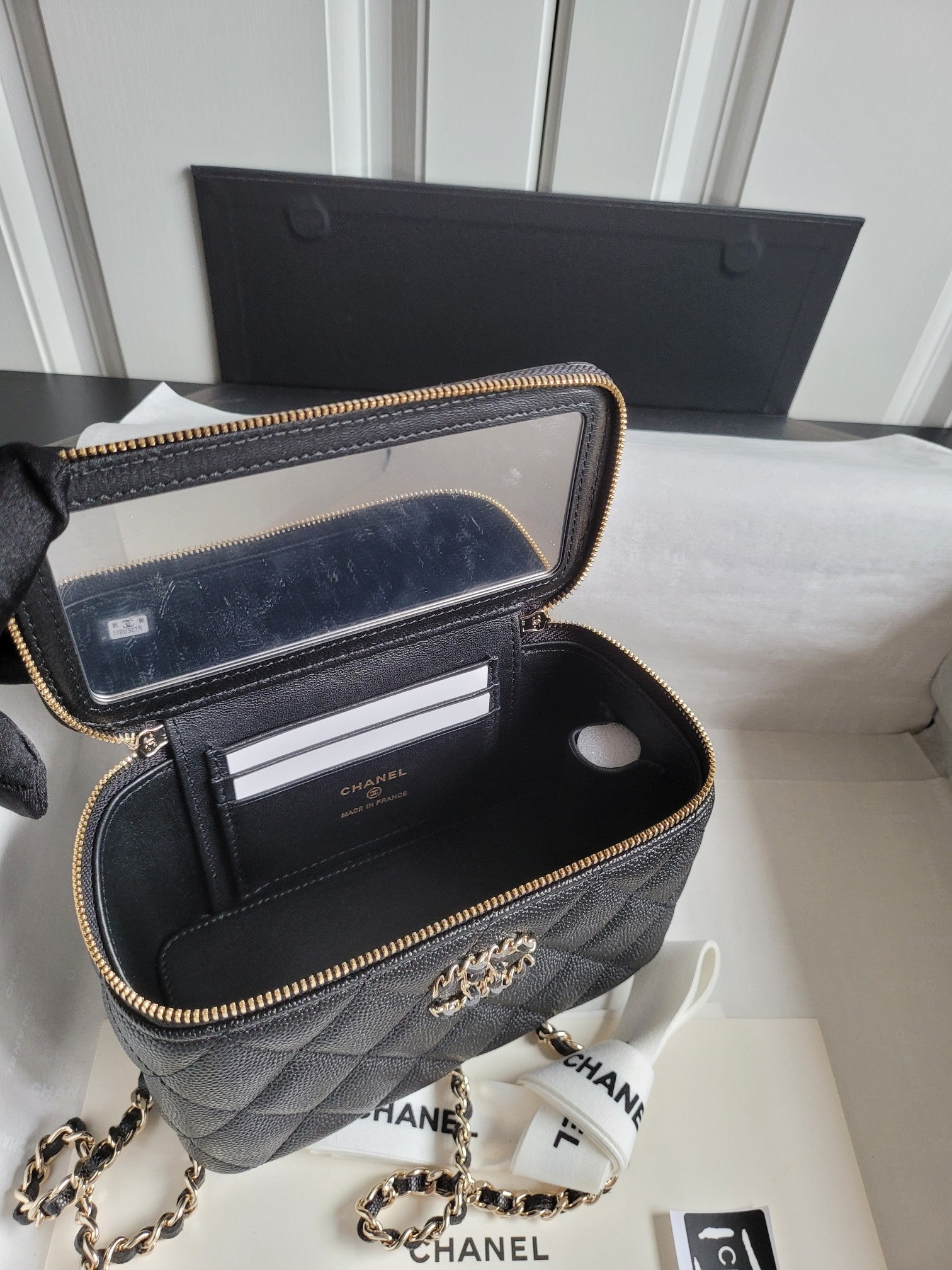 Chanel quilted crossbody bag with open top, card slot divider, gold chain strap