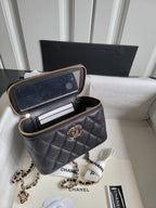 Chanel quilted mini bag with open interior, gold chain strap and front CC emblem