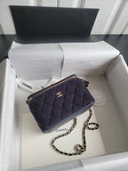 Chanel quilted mini shoulder bag with gold zipper, dark navy and chain strap