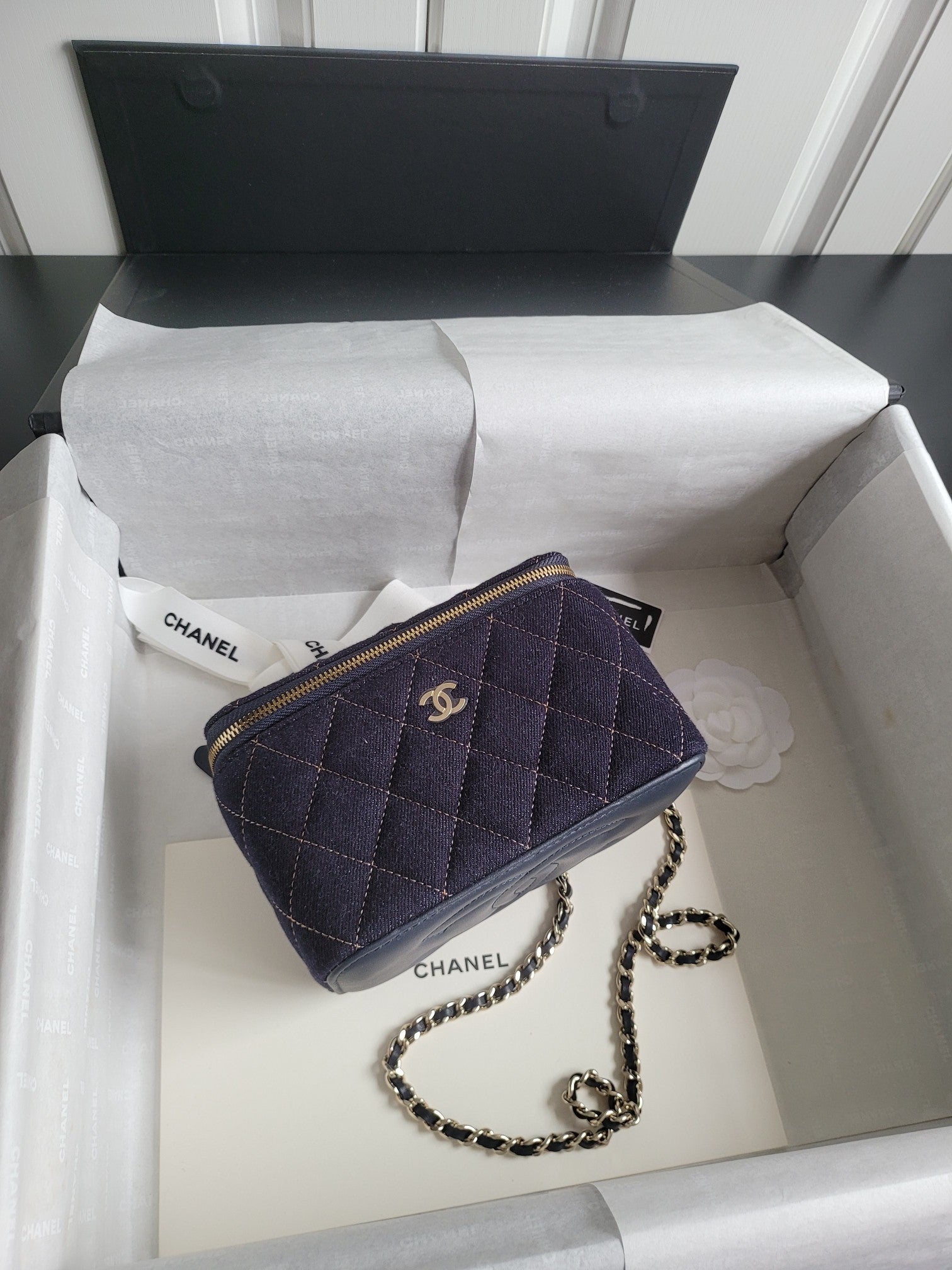Chanel quilted mini shoulder bag with gold zipper, dark navy and chain strap