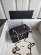 Chanel quilted mini shoulder bag with chain strap, dark navy, gold zipper and logo
