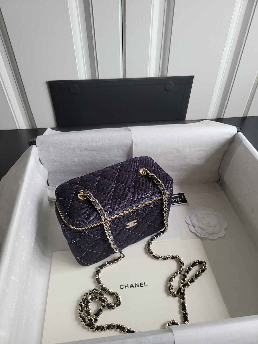 Chanel quilted mini crossbody bag, dark navy with chain strap and gold zipper