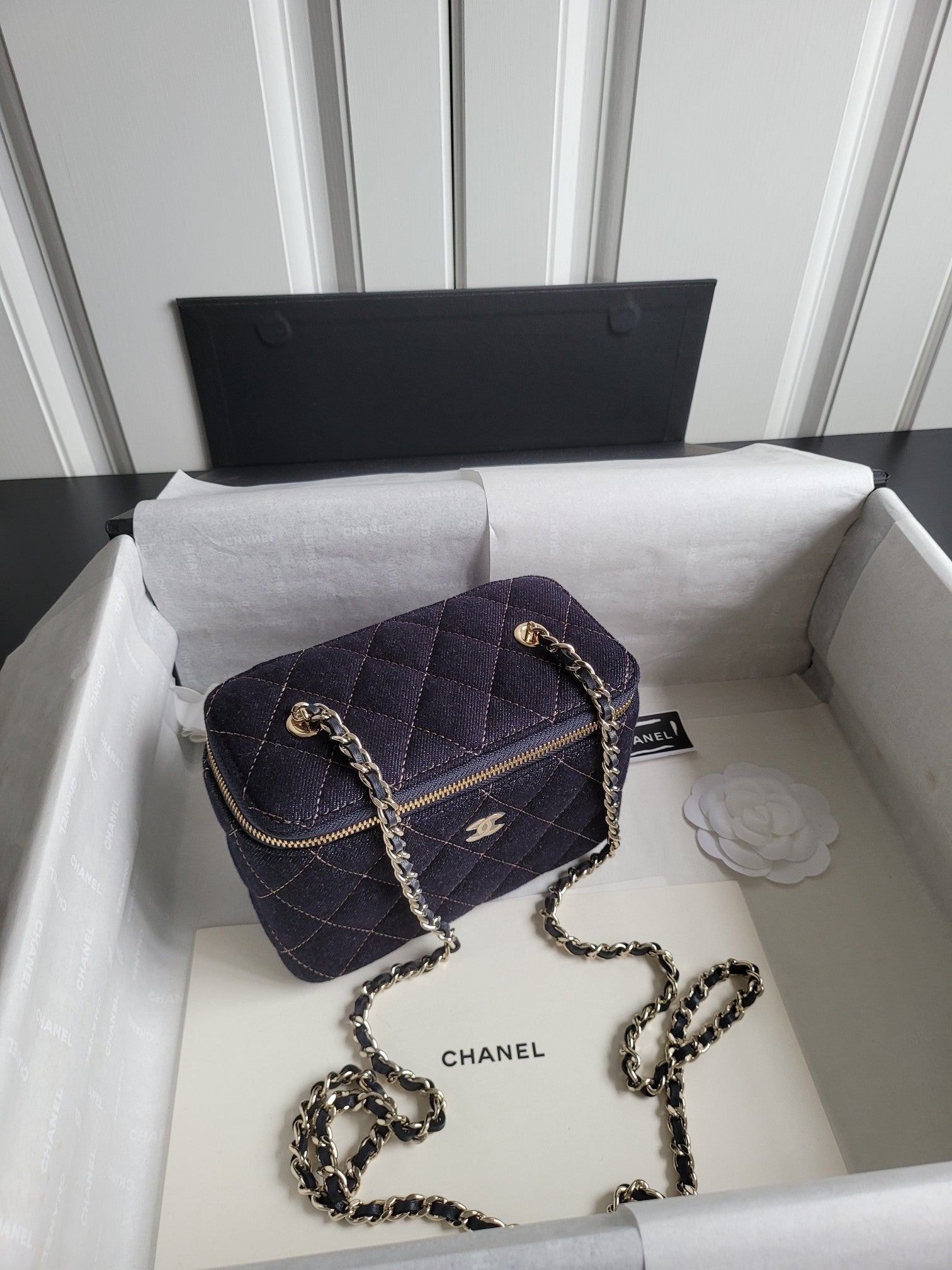 Chanel quilted mini crossbody bag, dark navy with chain strap and gold zipper