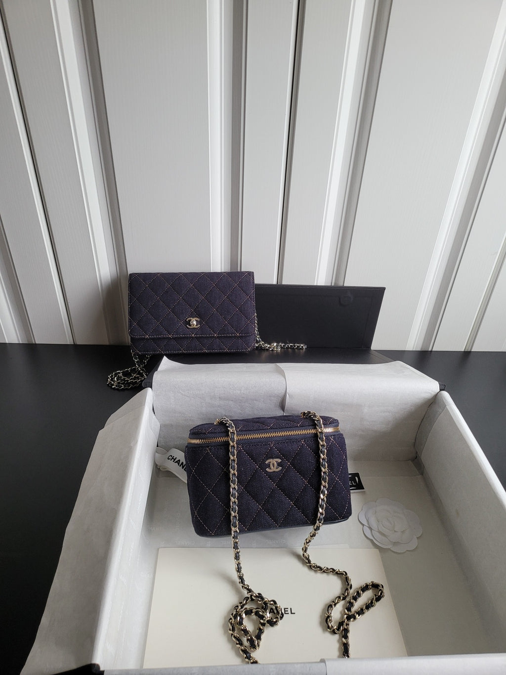 Chanel quilted mini shoulder bag with chain strap, dark navy, gold zipper trim