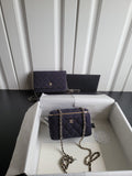 Chanel quilted mini shoulder bag with chain strap, dark navy, gold zipper trim