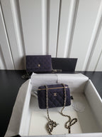 Chanel quilted mini shoulder bag with chain strap, dark navy, gold zipper trim