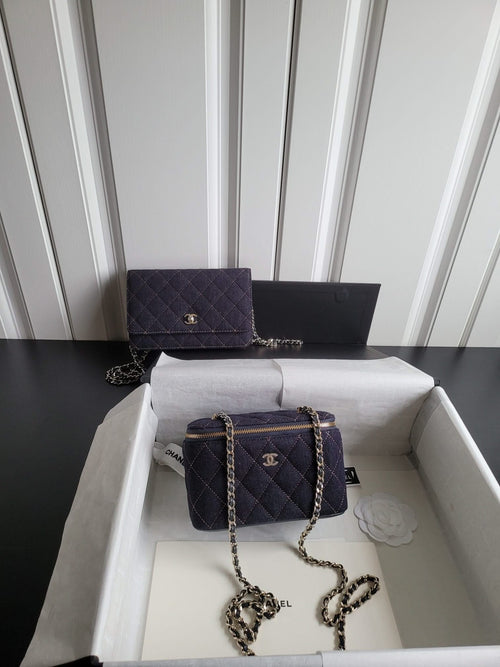 Chanel quilted mini shoulder bag with chain strap, dark navy, gold zipper trim