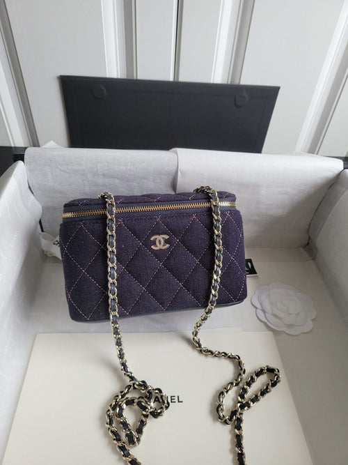 Chanel quilted mini bag with chain strap, dark navy, front zipper and gold hardware