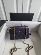 Chanel quilted mini shoulder bag with chain strap, dark navy, gold zipper trim