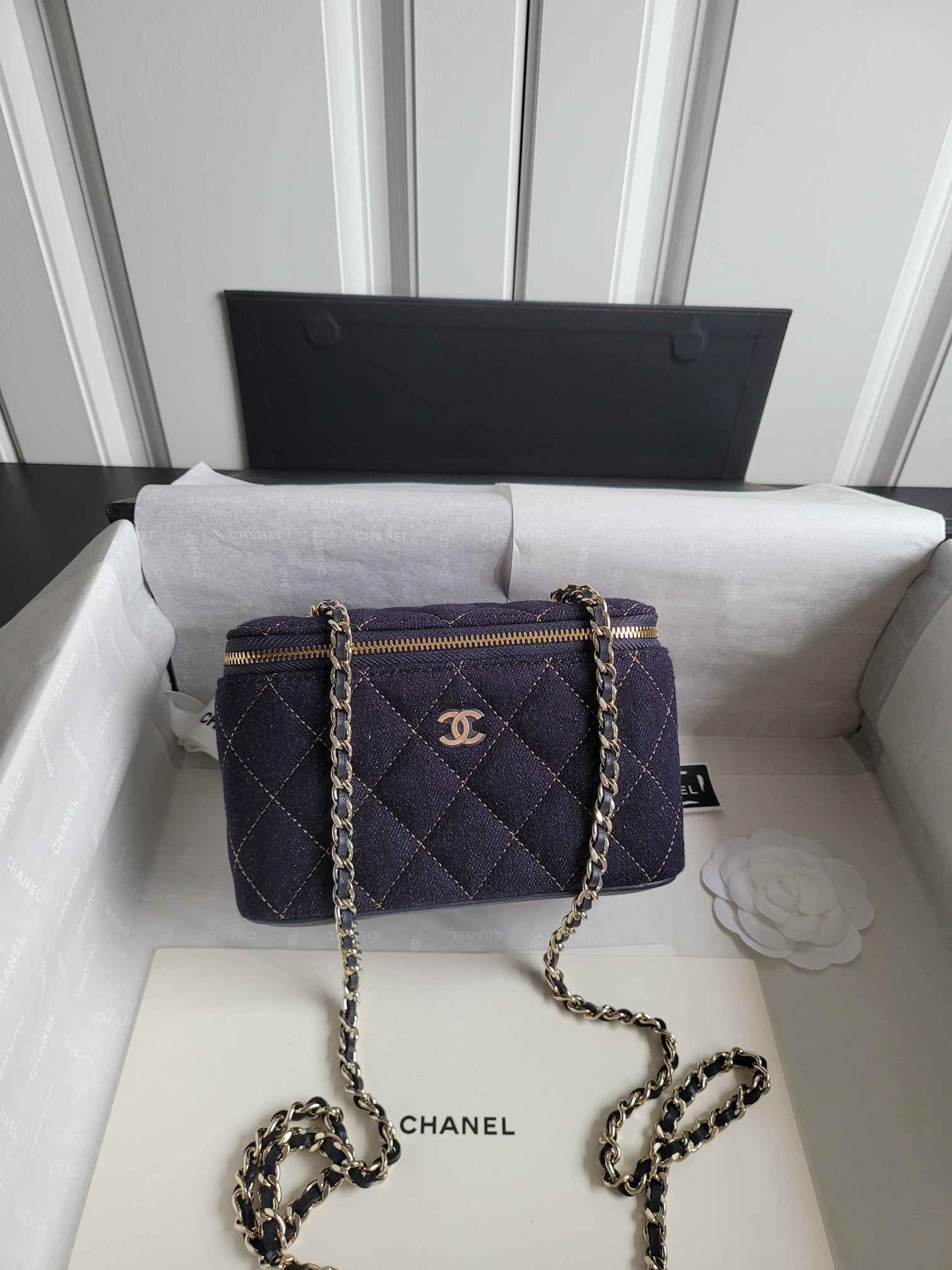 Chanel quilted mini shoulder bag with chain strap, dark navy, gold zipper trim