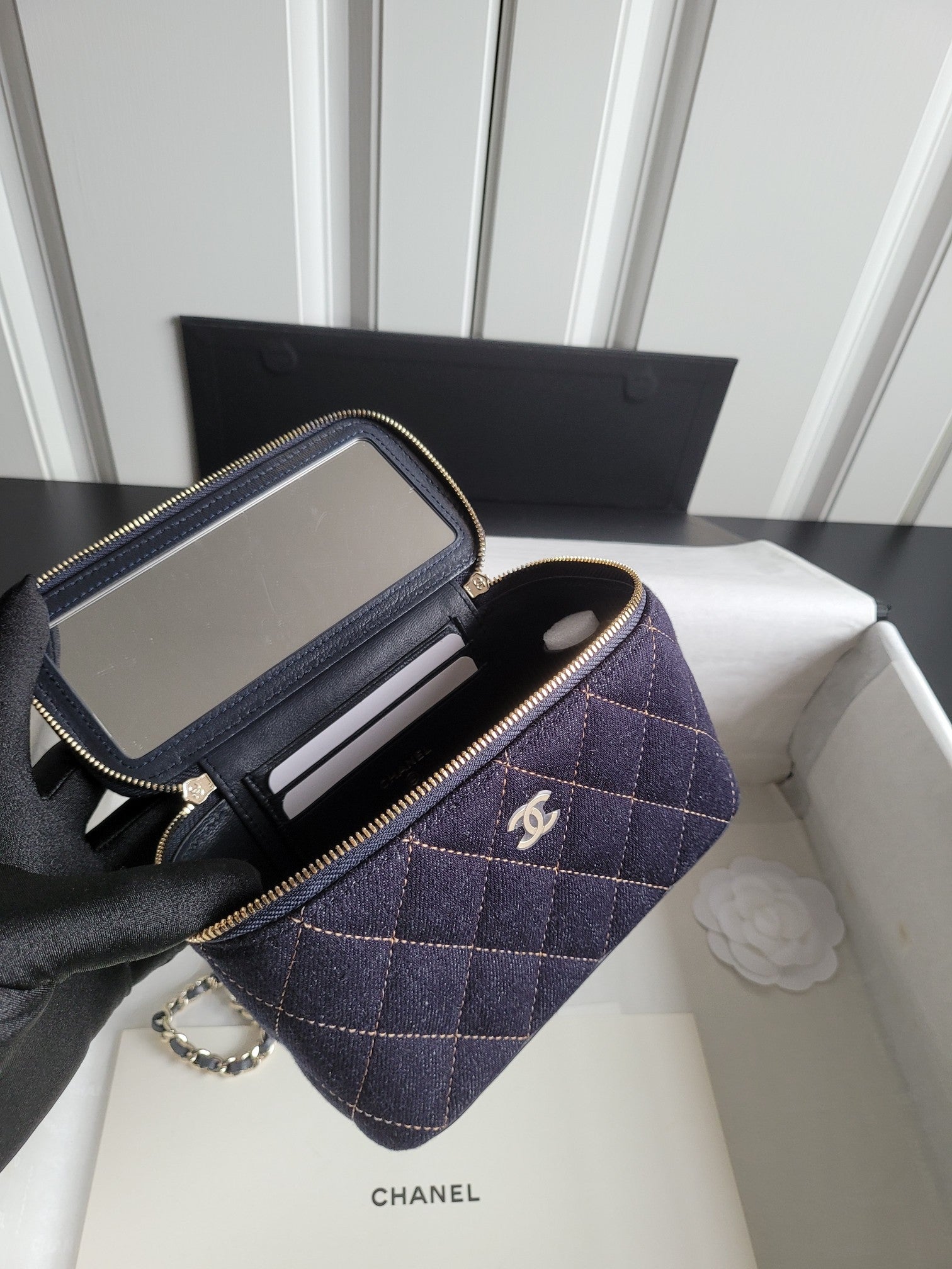 Chanel navy quilted bag open with card slot pocket and zip coin compartment