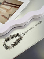 Silver-tone beaded bracelet with white pearl beads and chain, LV logo charm