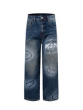 Prada denim pants in dark blue with graphic patches on the front legs