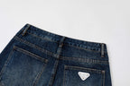 Prada denim pants back waist close-up with rear pocket and stitched detailing
