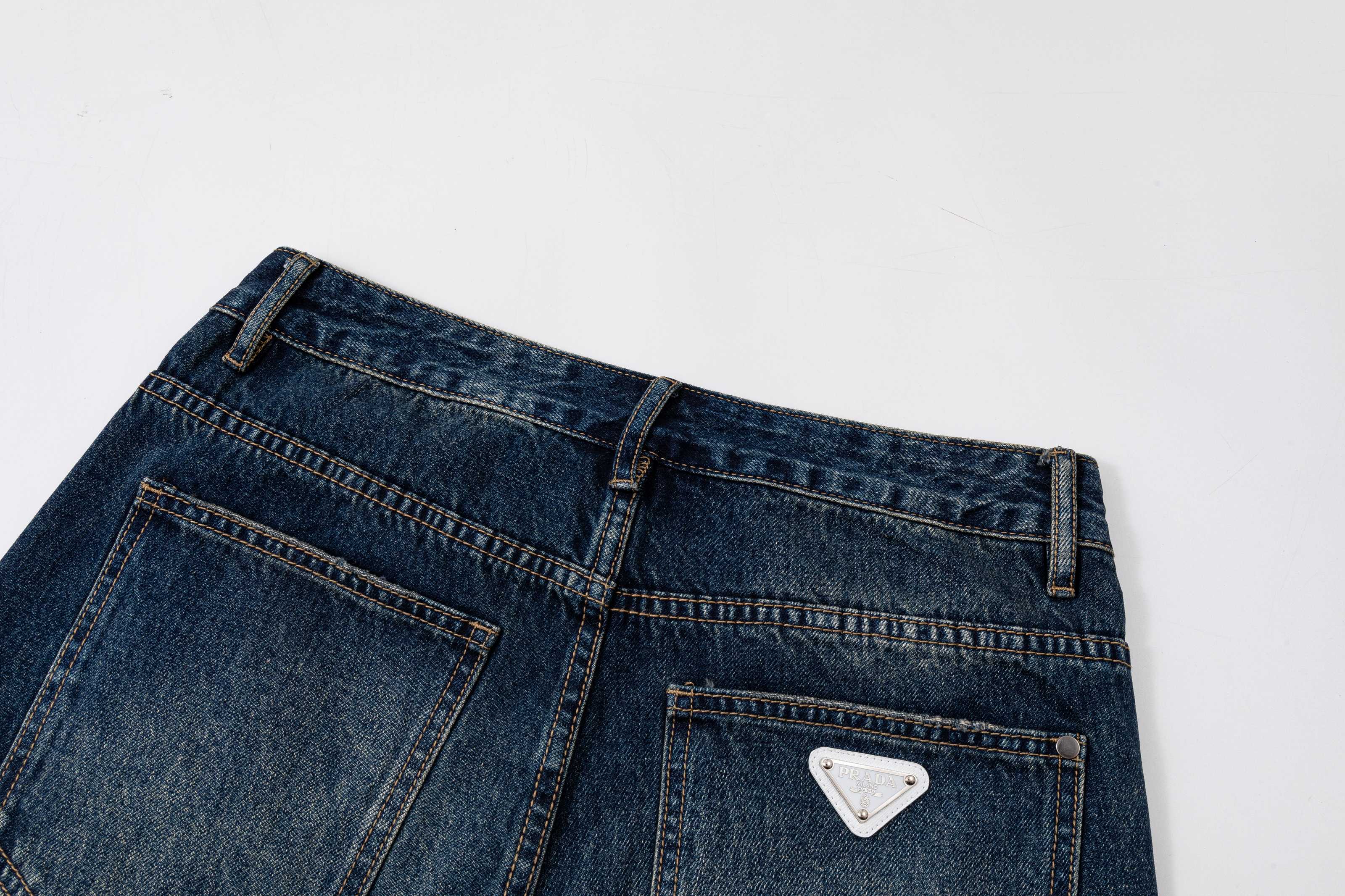 Prada denim pants back waist close-up with rear pocket and stitched detailing