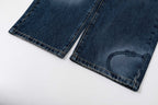 Prada denim pants in dark blue with visible hem and stitching