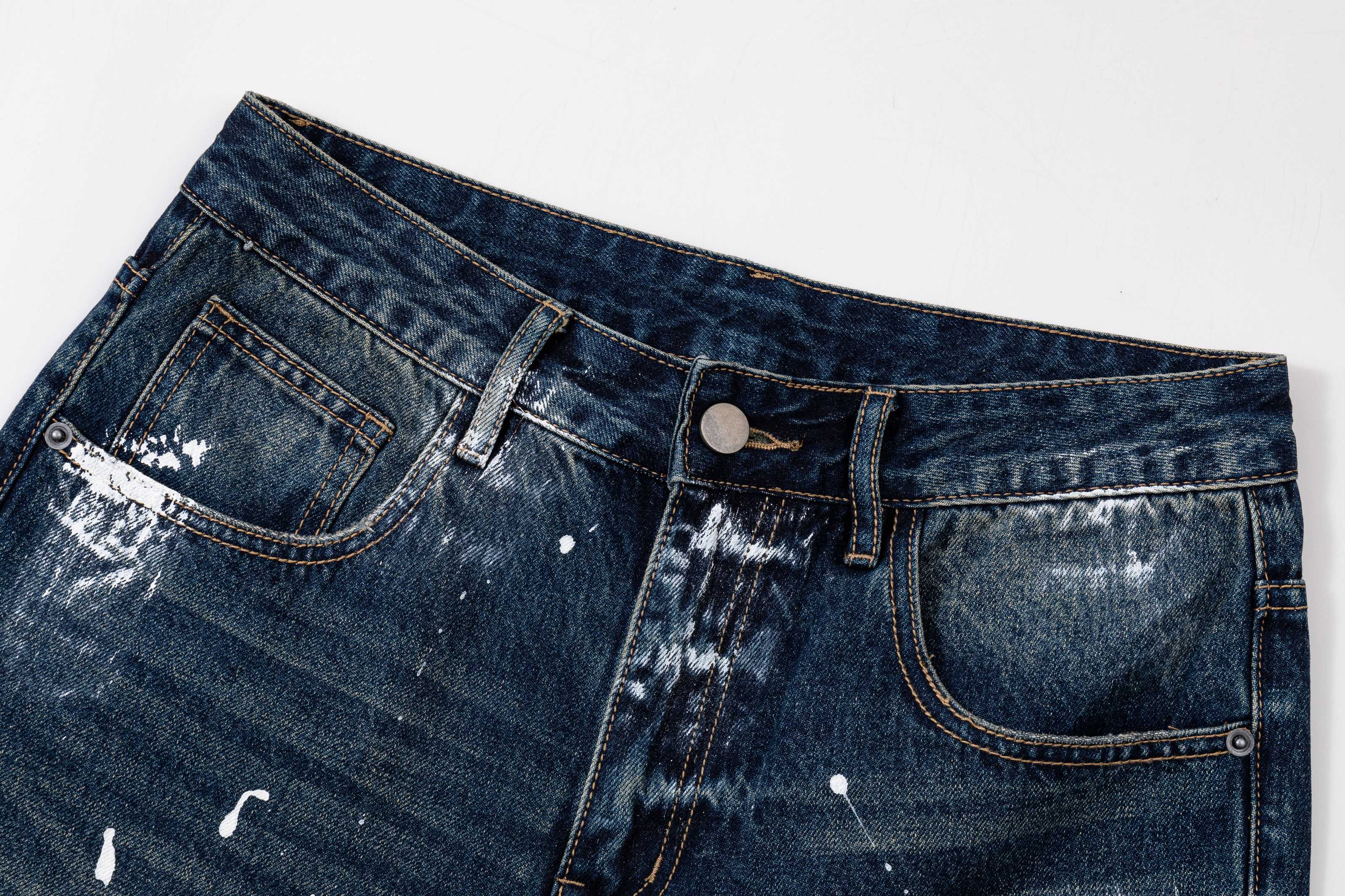 Prada denim pants waistband detail, dark blue with decorative stitching