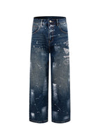 Prada denim pants in dark blue with paint splatter, wide straight legs