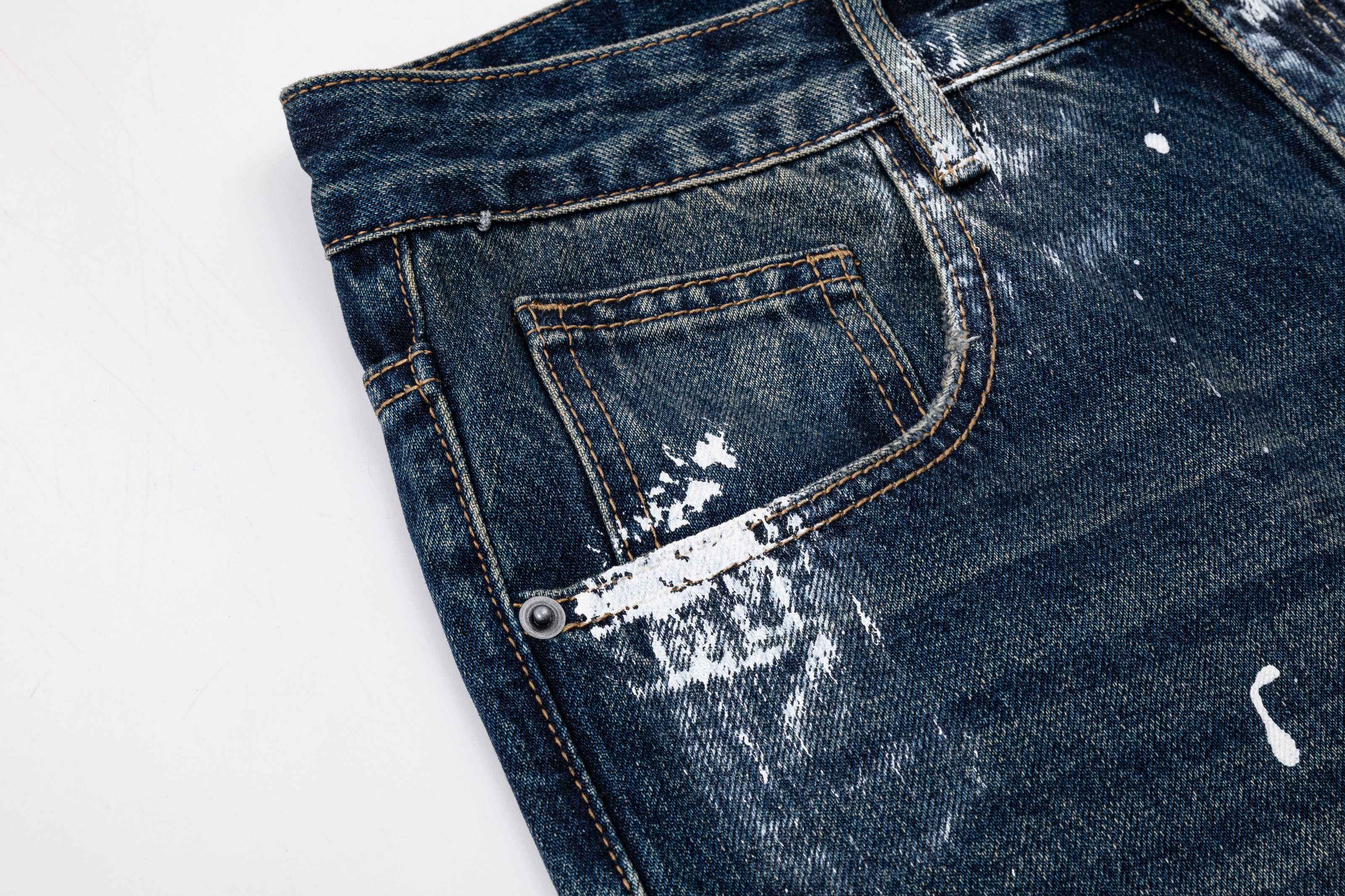 Prada denim pants front pocket with paint specks, dark blue denim
