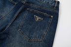 Prada denim pants back pocket with Prada logo patch, dark blue denim