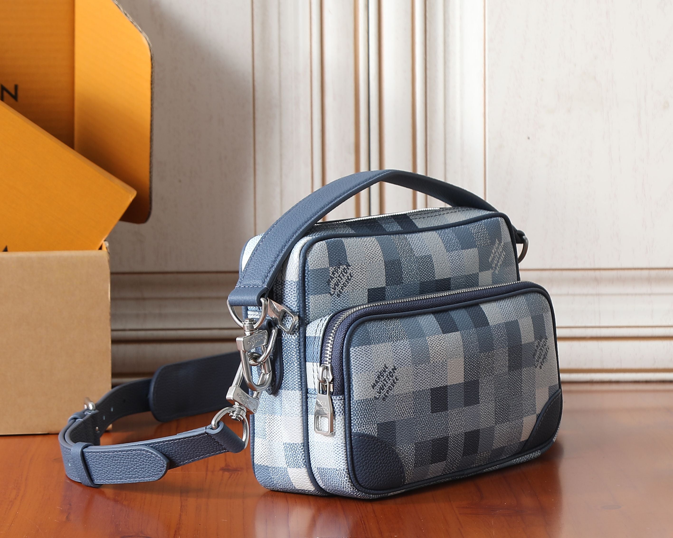 Louis Vuitton checkered crossbody bag with adjustable strap, blue and white canvas, zip front