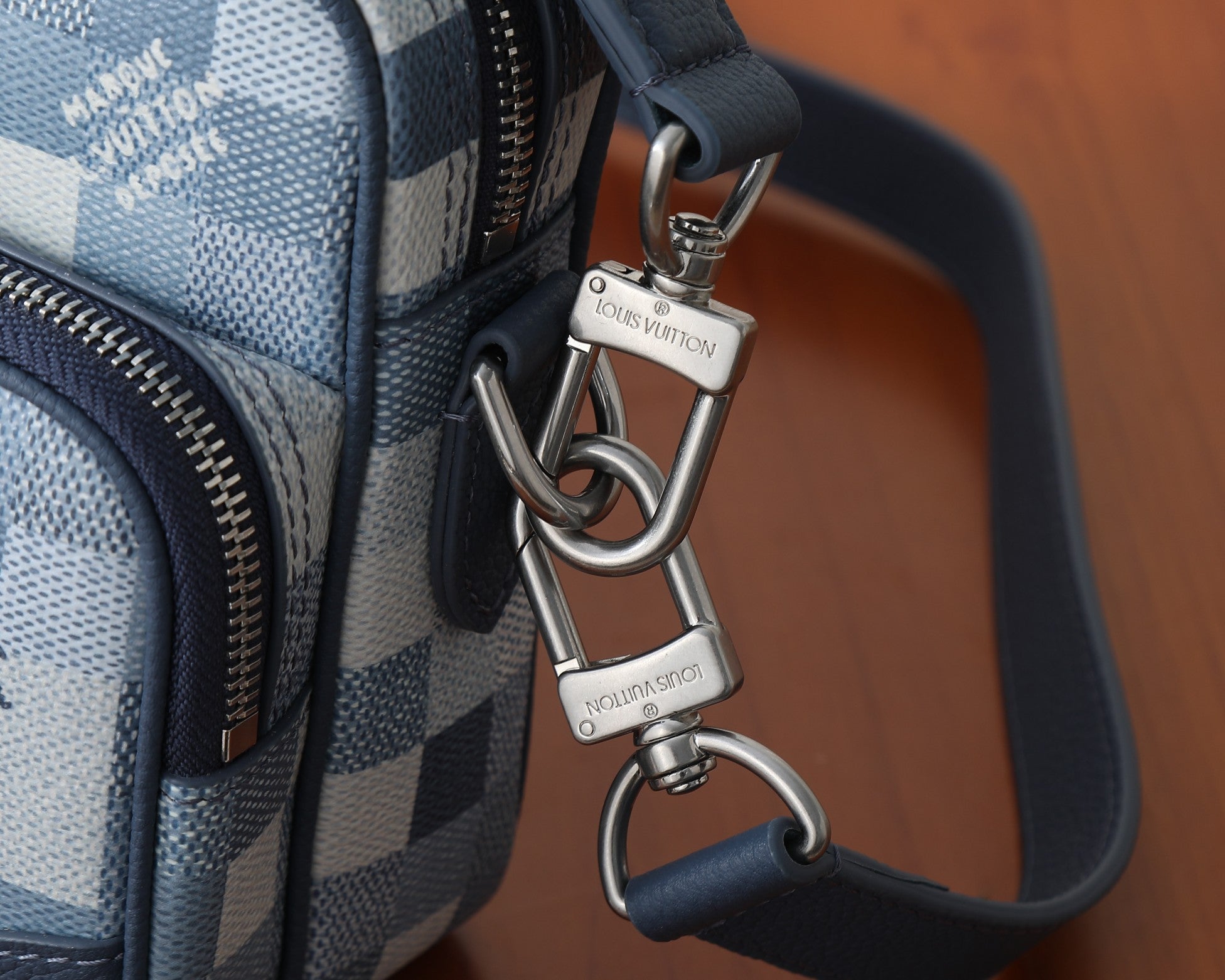 Louis Vuitton bag strap with silver-tone swivel hooks and lock, blue leather trim