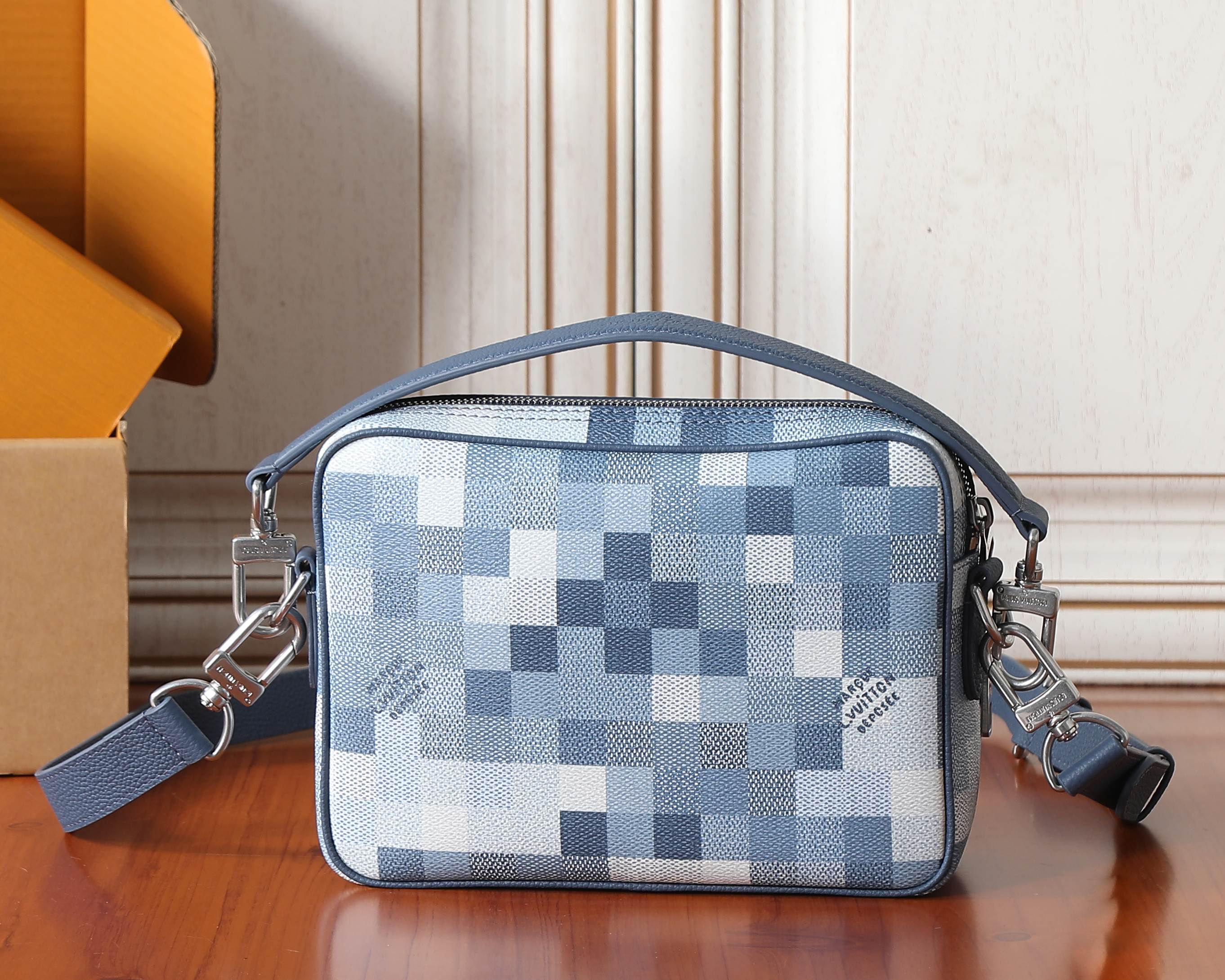 Louis Vuitton crossbody bag with blue check canvas and silver-tone side hardware