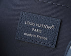 Louis Vuitton leather brand patch reading LOUIS VUITTON PARIS, made in France