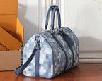 Louis Vuitton checkerboard duffel bag with shoulder strap and side handles