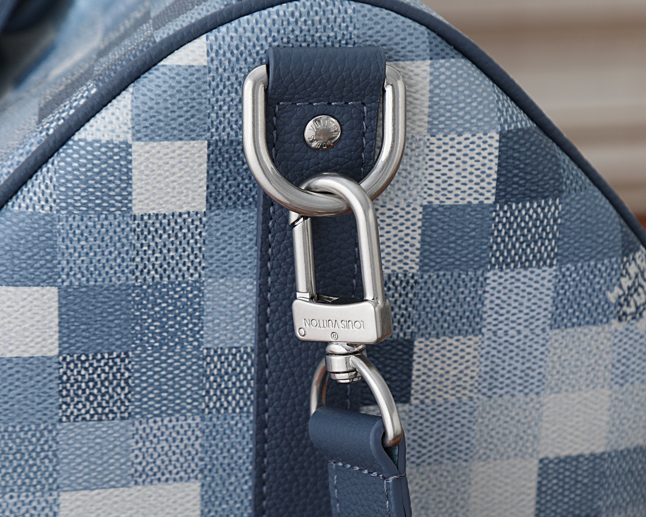 Louis Vuitton duffel bag metal D-ring and snap strap hardware