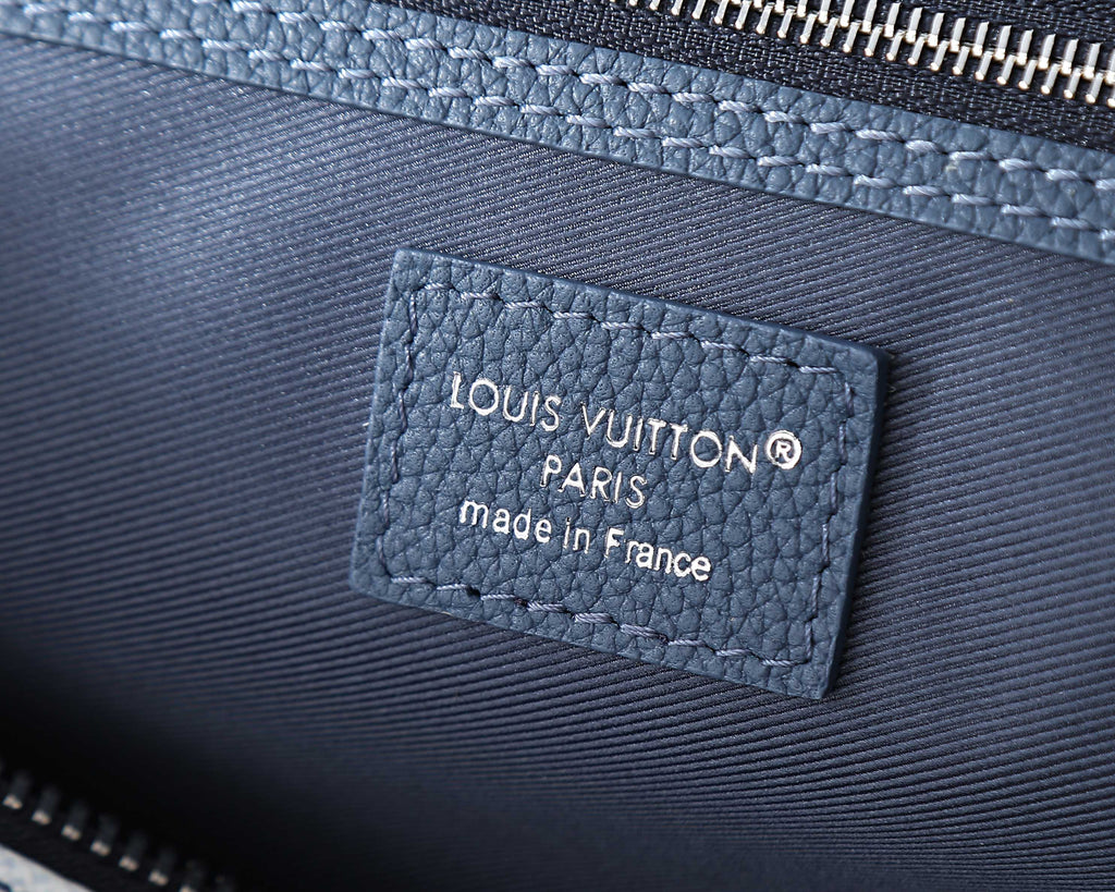 Louis Vuitton Paris leather patch reading 'made in France' on bag