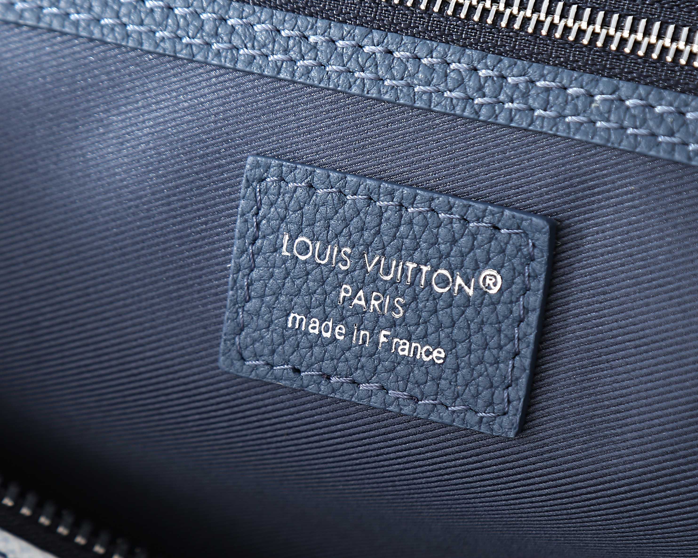 Louis Vuitton Paris leather patch reading 'made in France' on bag