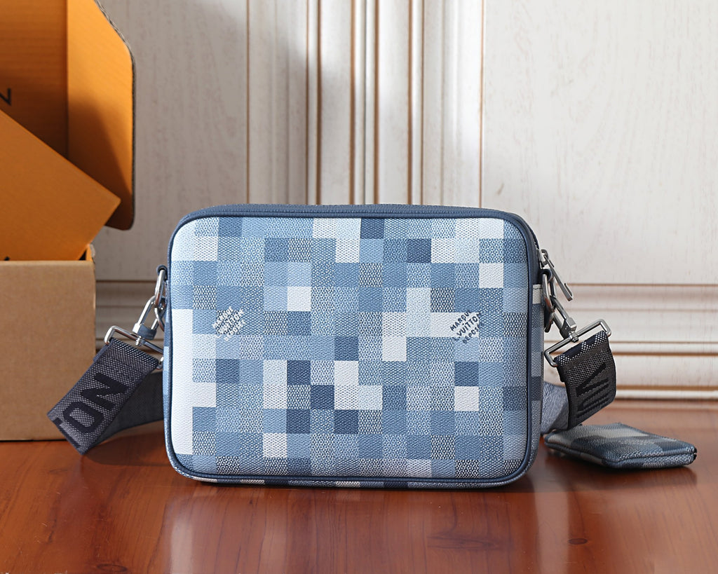 Checkered crossbody bag with side zipper and shoulder strap, blue and white.