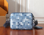 Checkered crossbody bag with side zipper and shoulder strap, blue and white.