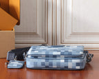 Checkered crossbody bag set with pouch, blue and white on wood floor.