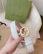 Gucci belt strap in white leather with embossed pattern and gold GG buckle