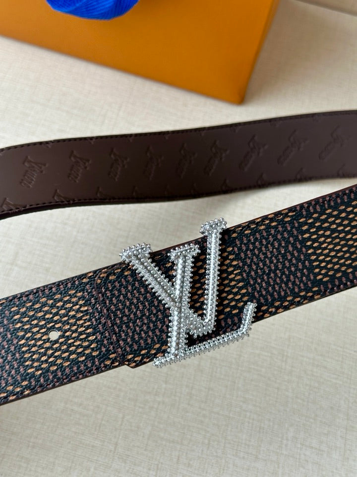 Dark monogram belt with embossed leather back and sparkling silver-tone LV buckle.
