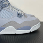 Close-up of light blue Air Jordan 4 midsole and side panel with stitched seam